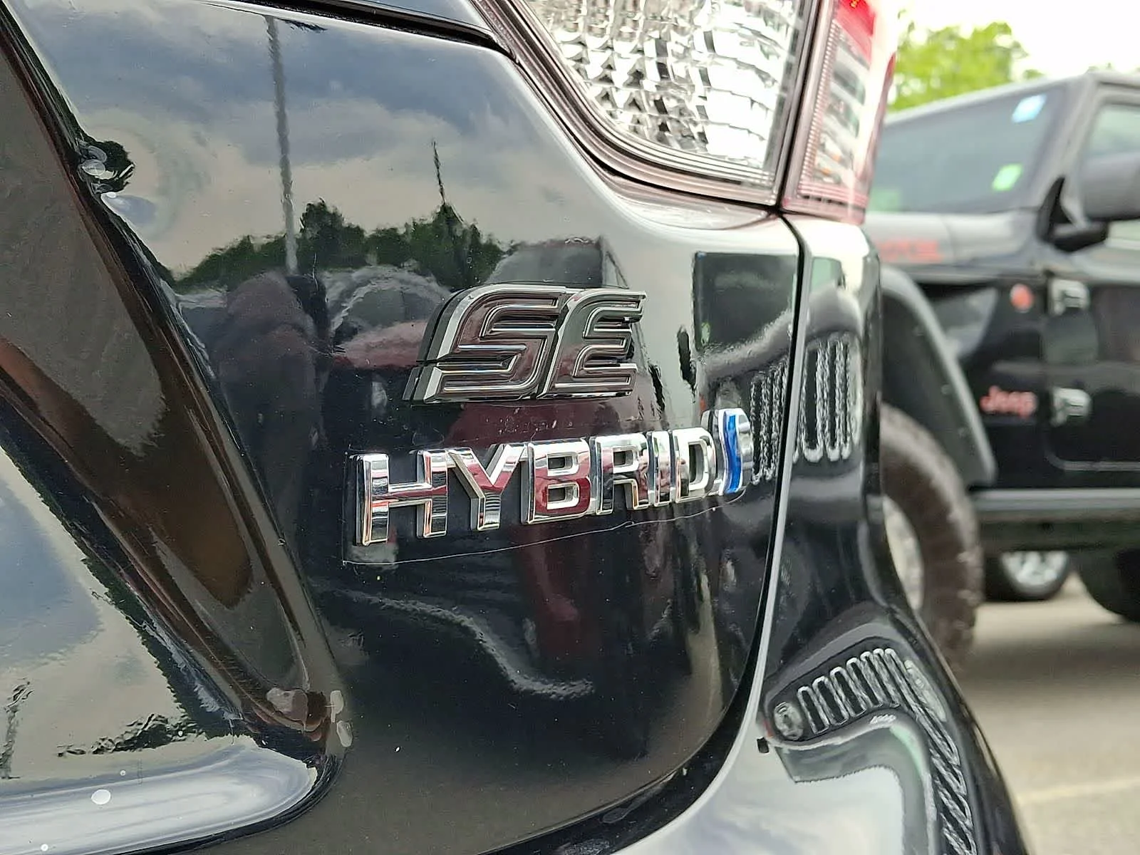 Used 2024 Midnight Black Metallic Toyota Hybrid SE image 34