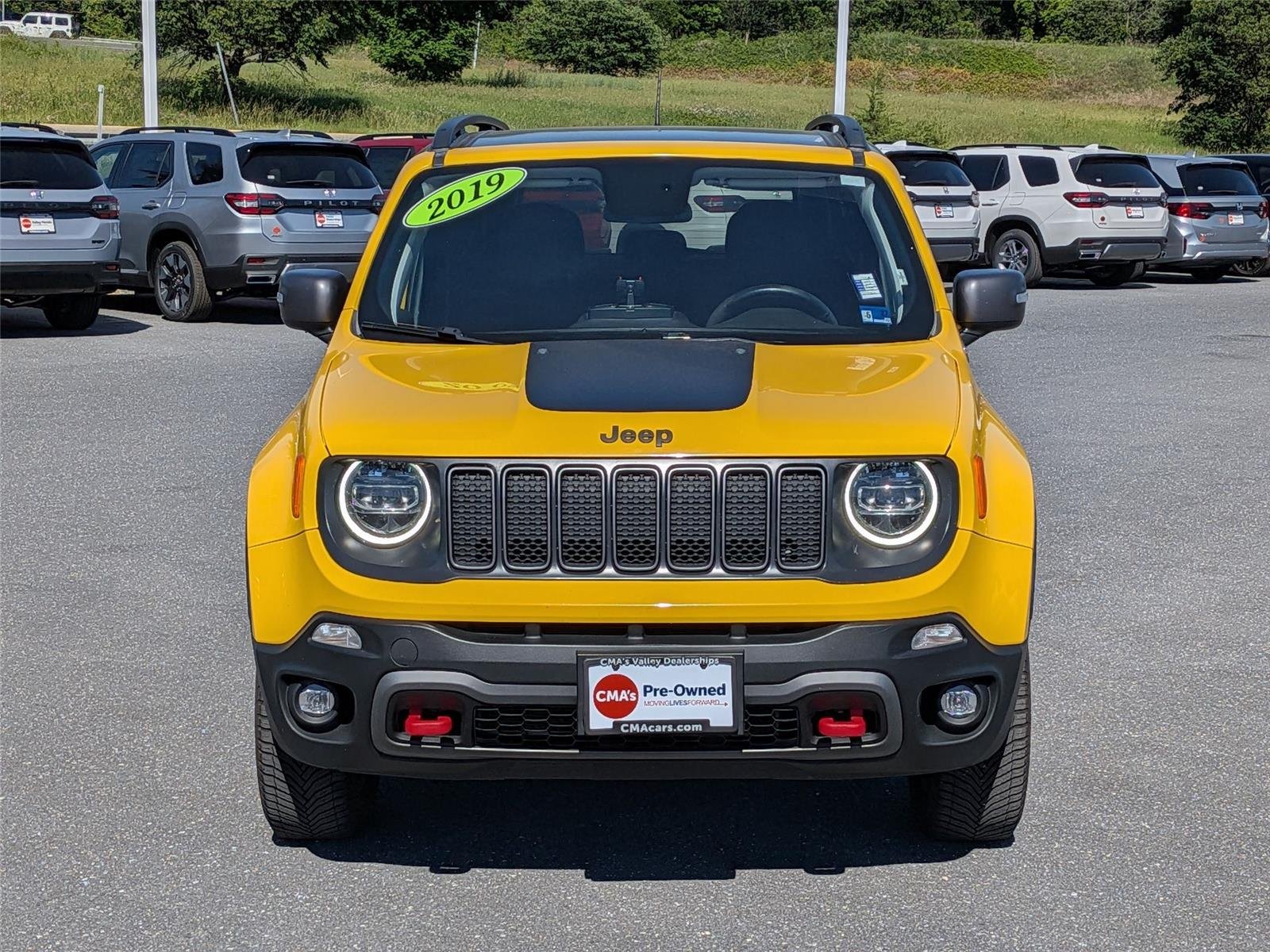 Used 2019 Solar Yellow Clearcoat Jeep Trailhawk image 2