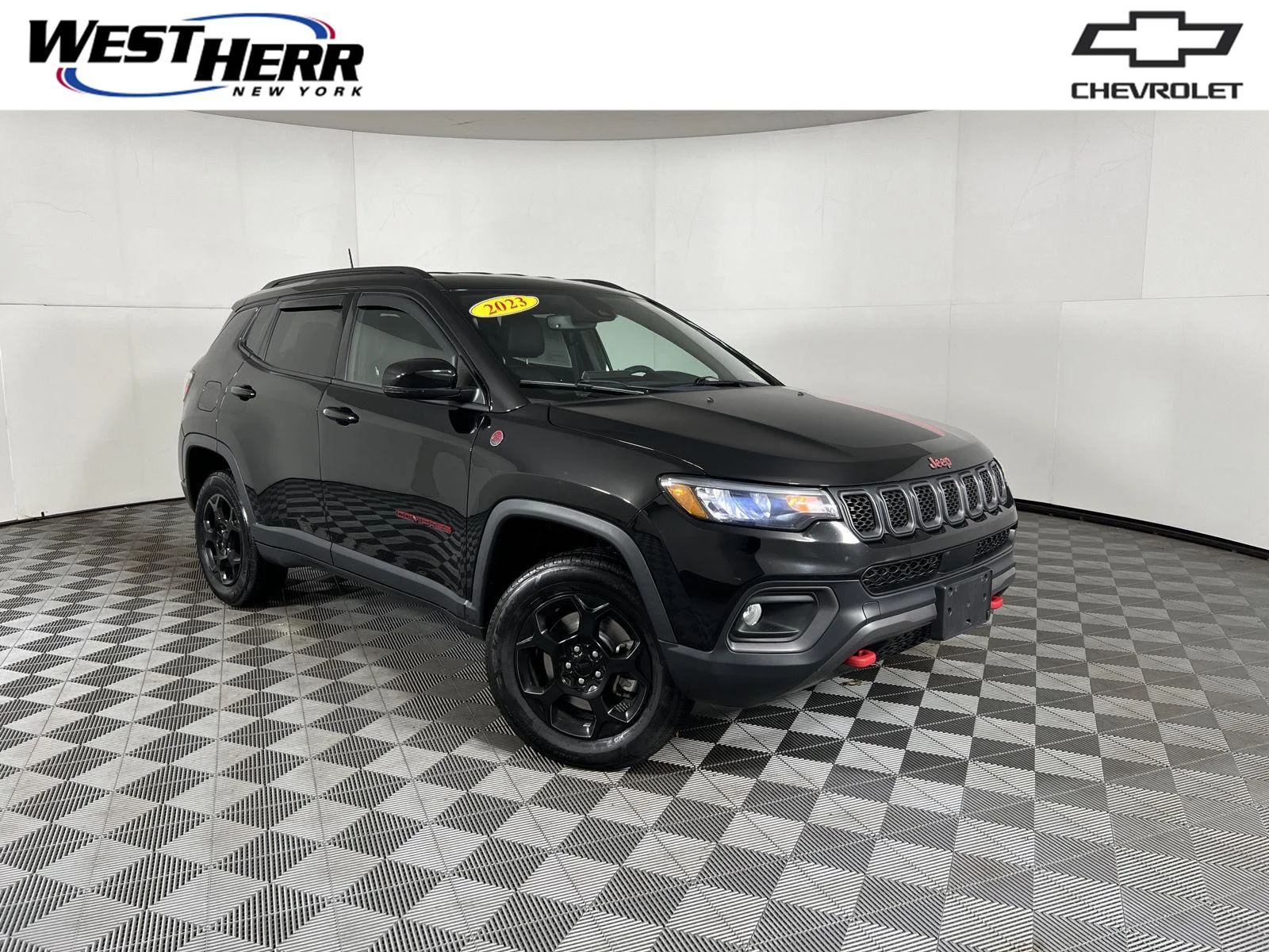 Used 2023 Diamond Black Crystal Pearlcoat Jeep Trailhawk image 1