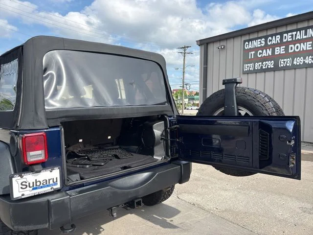 Used 2013 Blue Jeep Unlimited Sport image 11