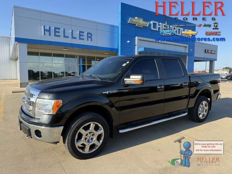 Used 2014 Tuxedo Black Metallic Ford XLT image 1