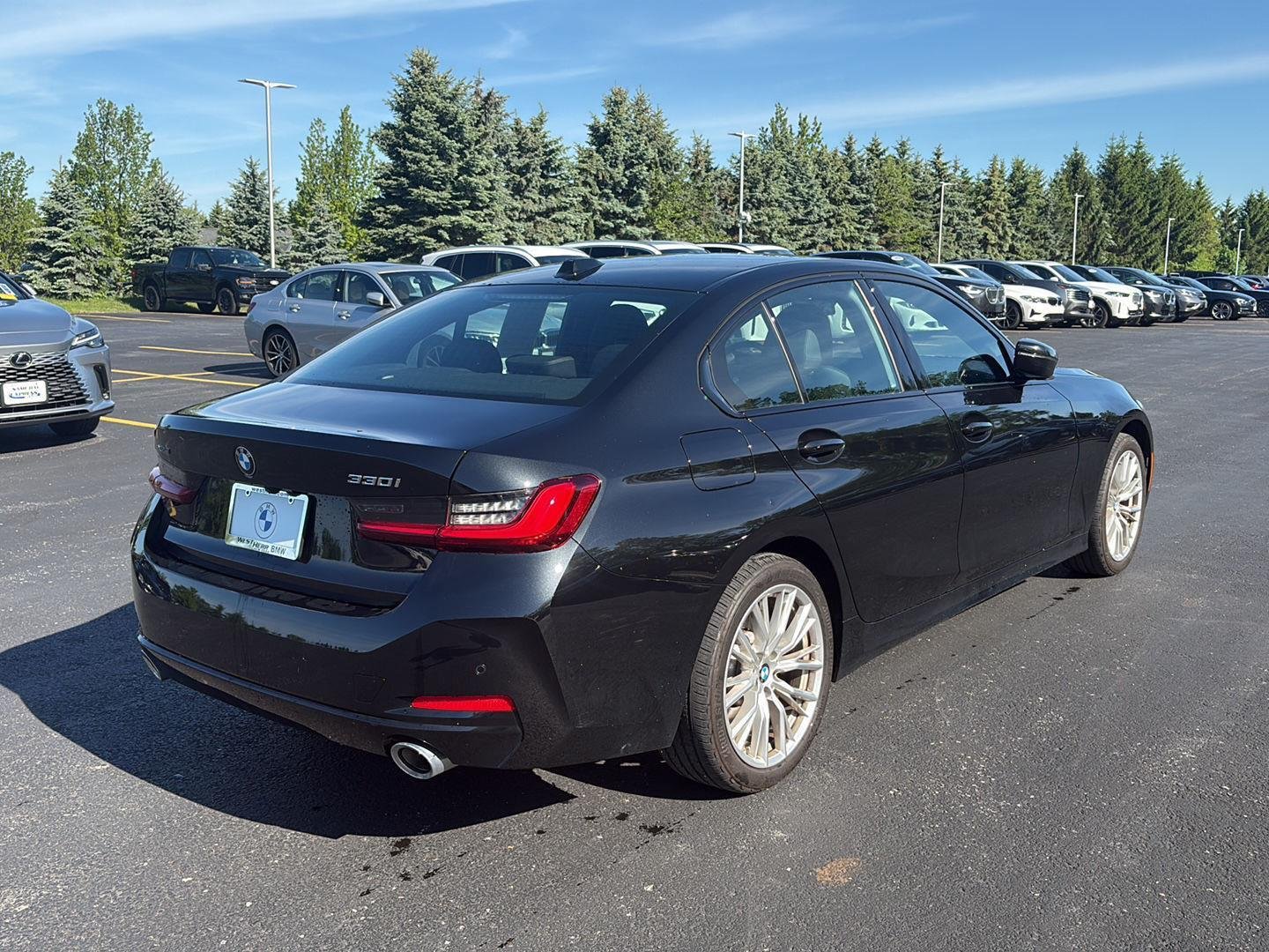 Certified Used 2023 Black Sapphire Metallic BMW 330i xDrive image 3