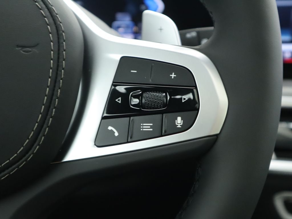 Used 2026 Black Sapphire Metallic BMW xDrive50e image 13