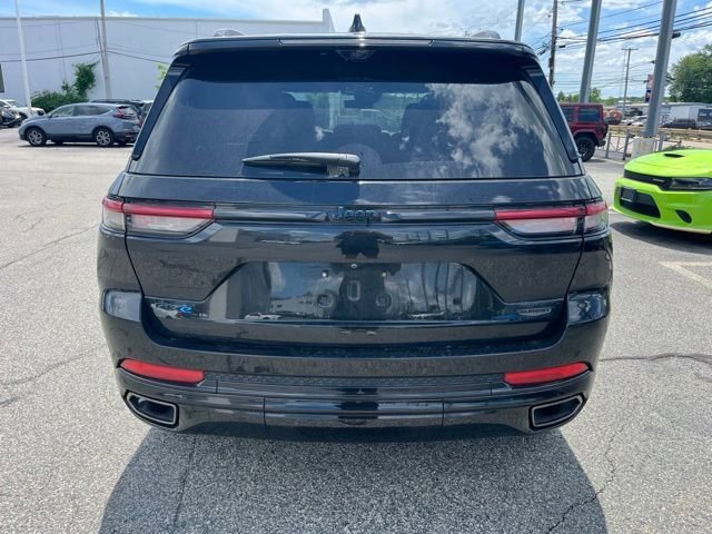 Used 2023 Diamond Black Jeep Summit Reserve 4xe image 4
