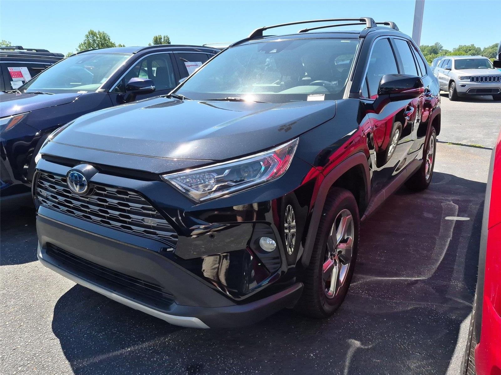 Used 2020 Midnight Black Metallic Toyota Hybrid Limited image 1