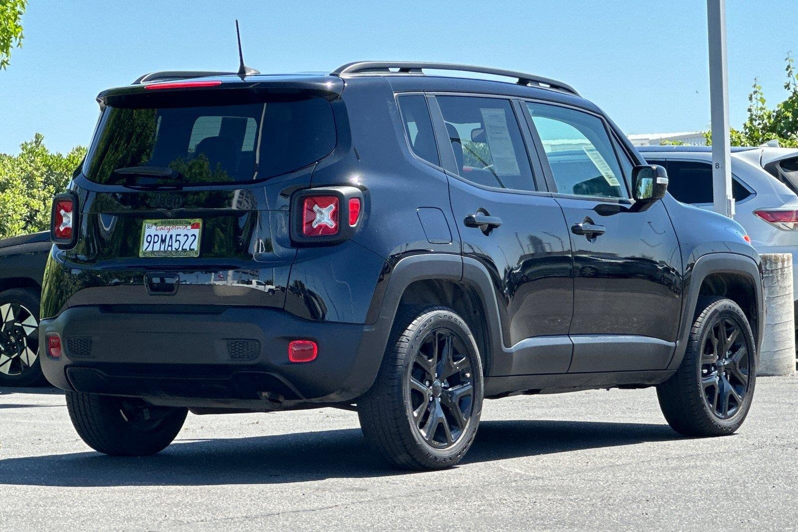 Used 2023 Black Clearcoat Jeep Altitude image 4