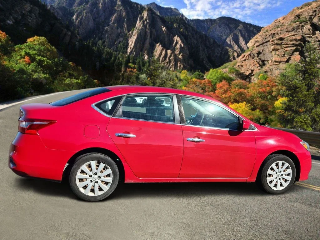 Used 2017 Red Nissan SV image 2