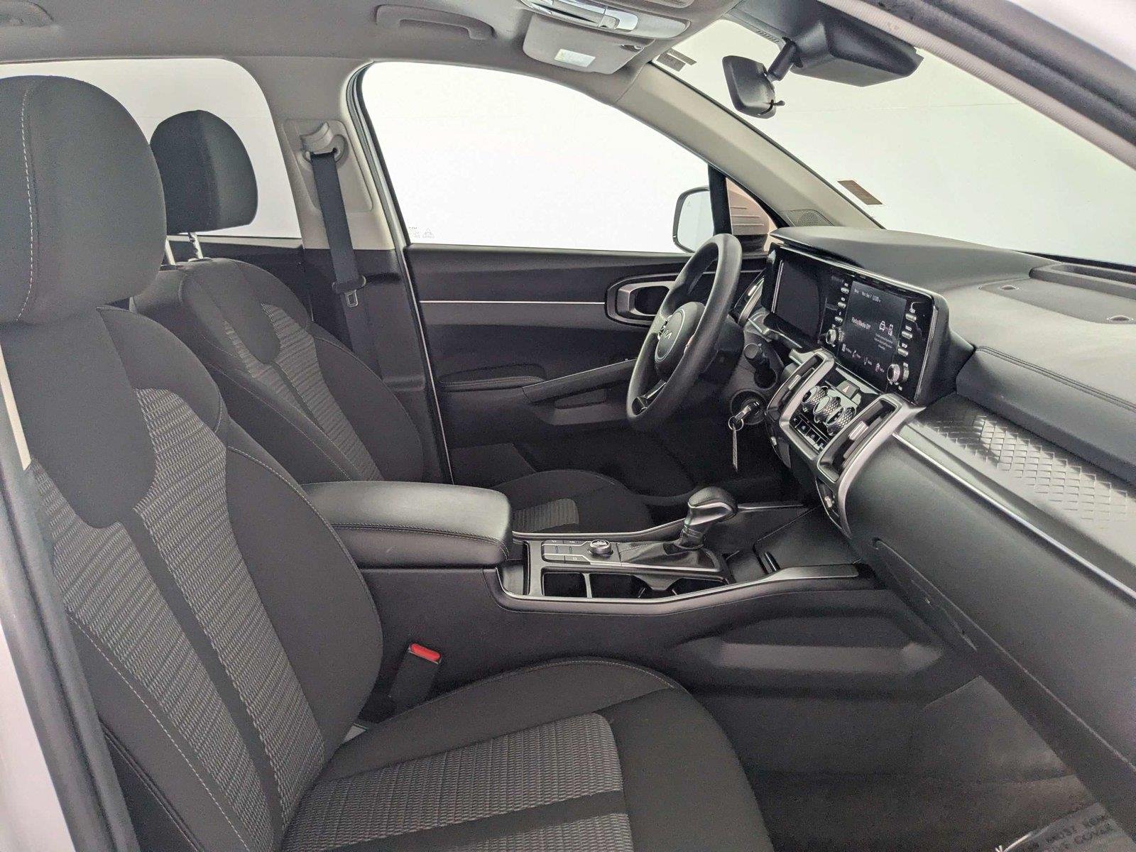 Used 2023 Glacial White Pearl Kia LX image 28