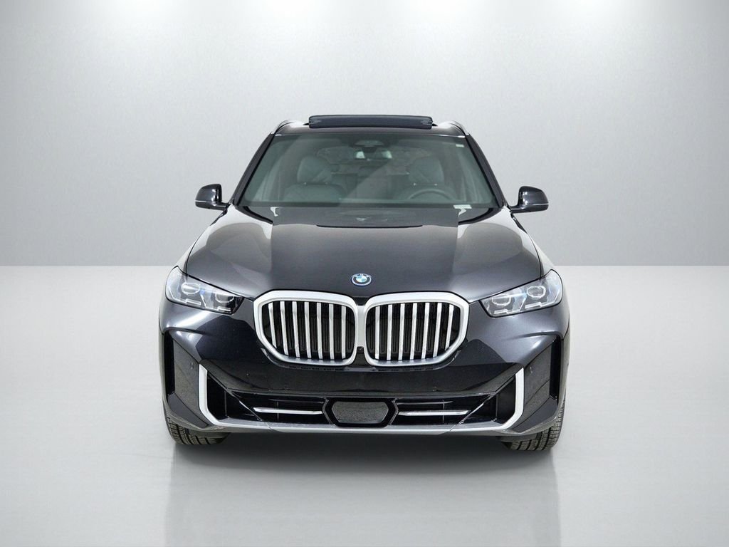 Used 2026 Black Sapphire Metallic BMW xDrive50e image 3