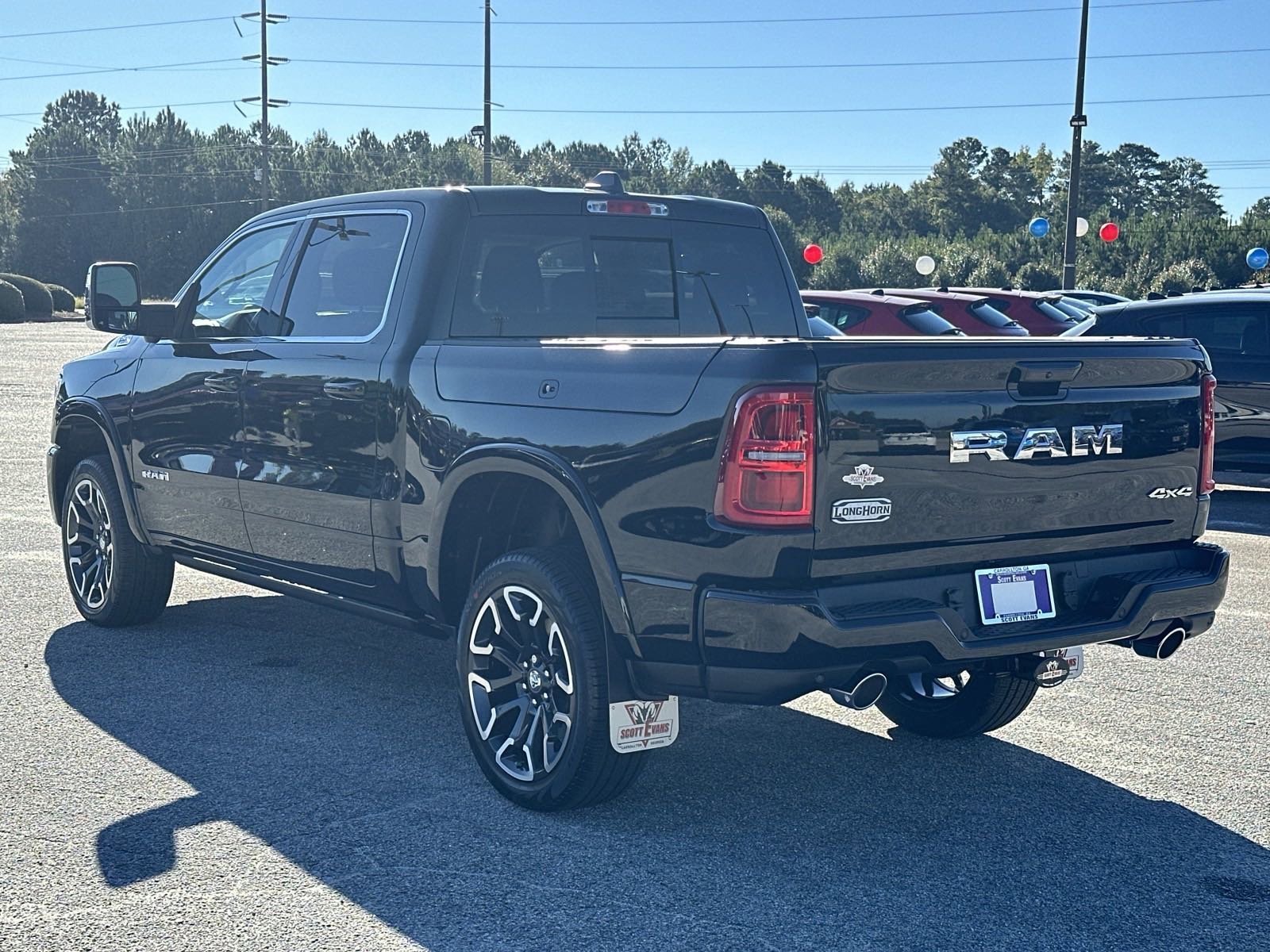 New 2025 Diamond Black Crystal Pearl-Coat Exterior Paint RAM Longhorn 4x4 Crew Cab 5