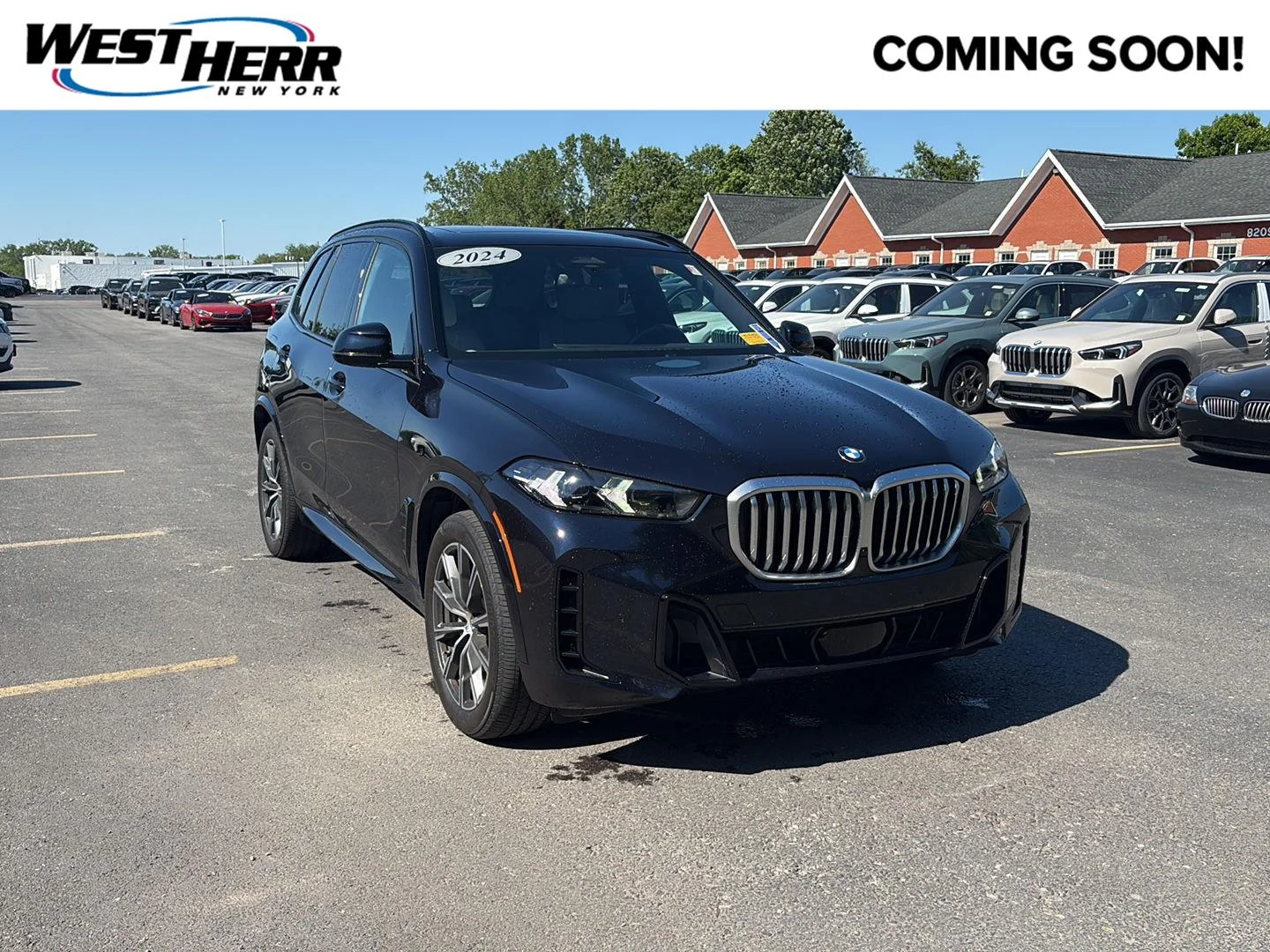 Used 2024 Carbon Black Metallic BMW xDrive40i image 1