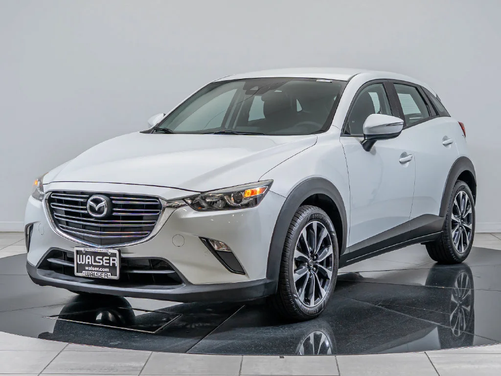 Used 2019 Ceramic Metallic Mazda Touring image 1