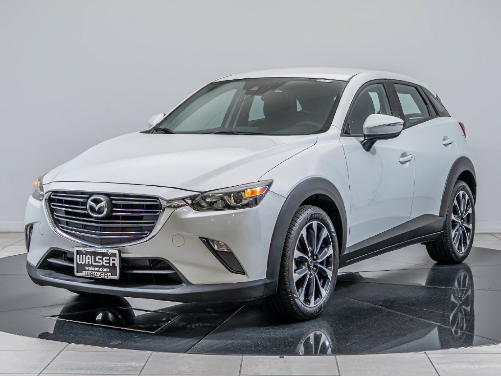 Used 2019 Ceramic Metallic Mazda Touring image 1