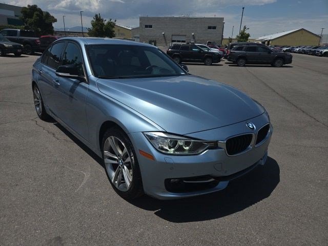 Used 2013 Liquid Blue Metallic BMW 328i xDrive image 1