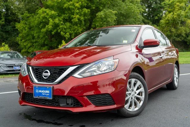 Used 2019 Red Nissan SV image 1