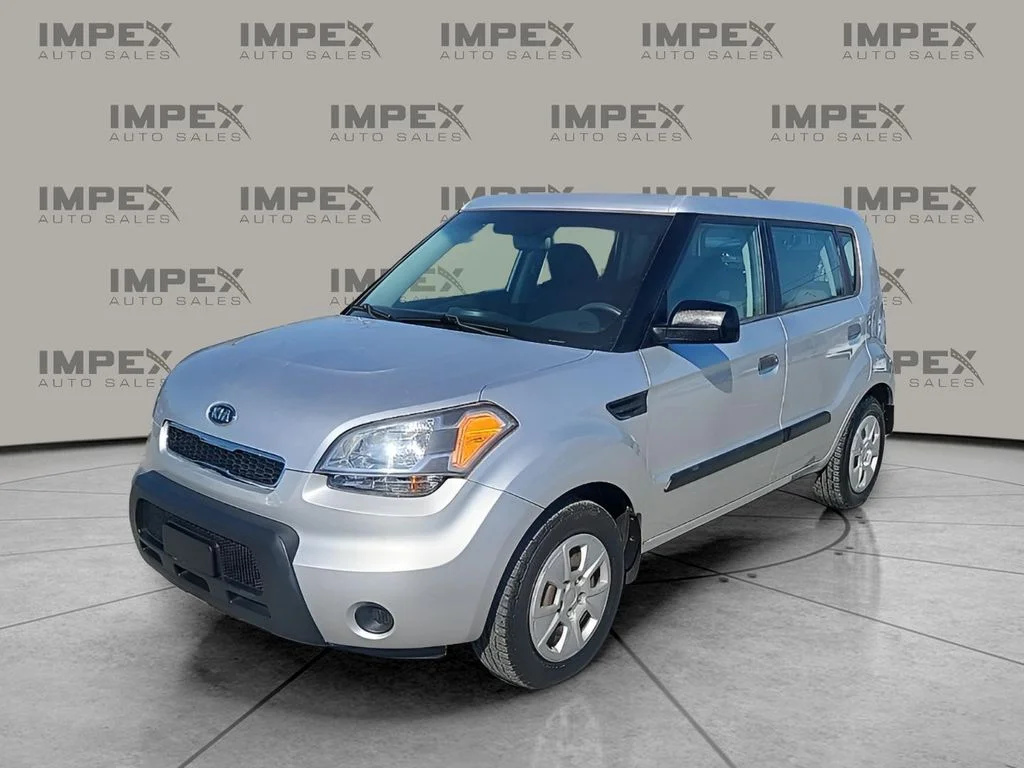 Used 2010 Silver Kia Base image 1