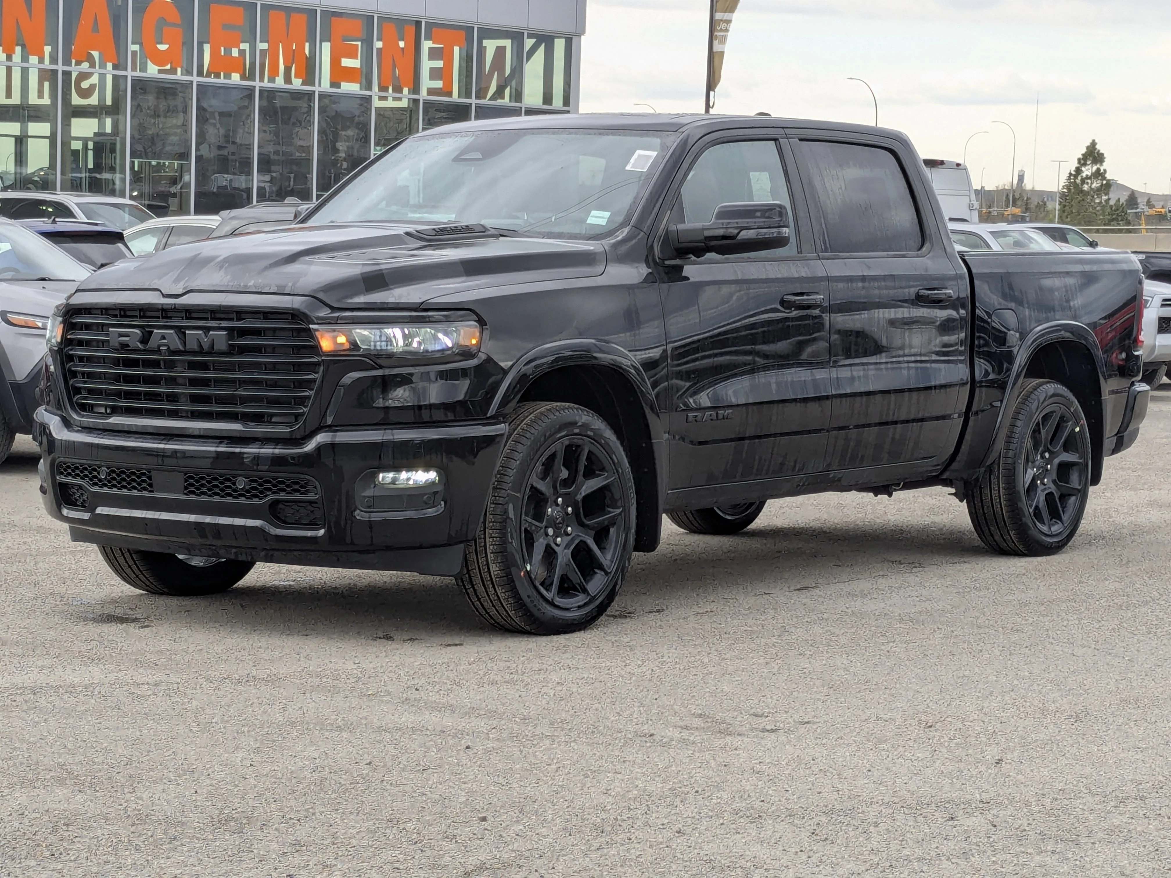 New 2026 Black RAM Laramie - - Twin Turbo - 22 Black Wheels - 14.4 Screen - Harman/Kardon - Pano Sunroof & More! image 4