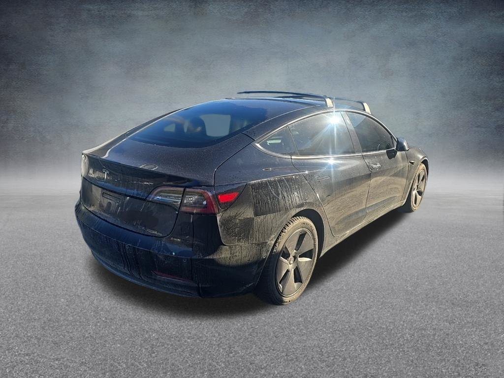Used 2021 Solid Black Tesla Standard Range Plus image 7