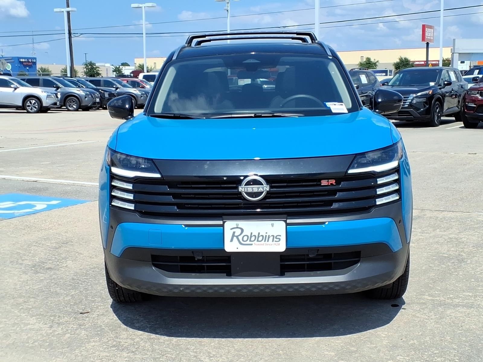 2026 Nissan Kicks SR Blue at Robbins Nissan