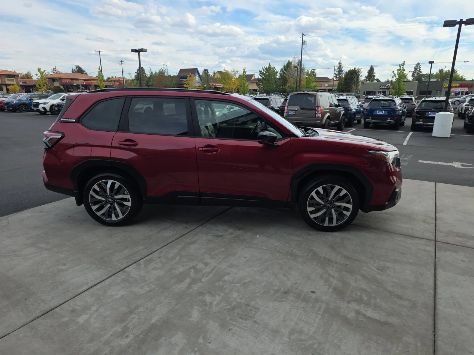 Used 2025 Crimson Red Pearl Subaru Touring image 4