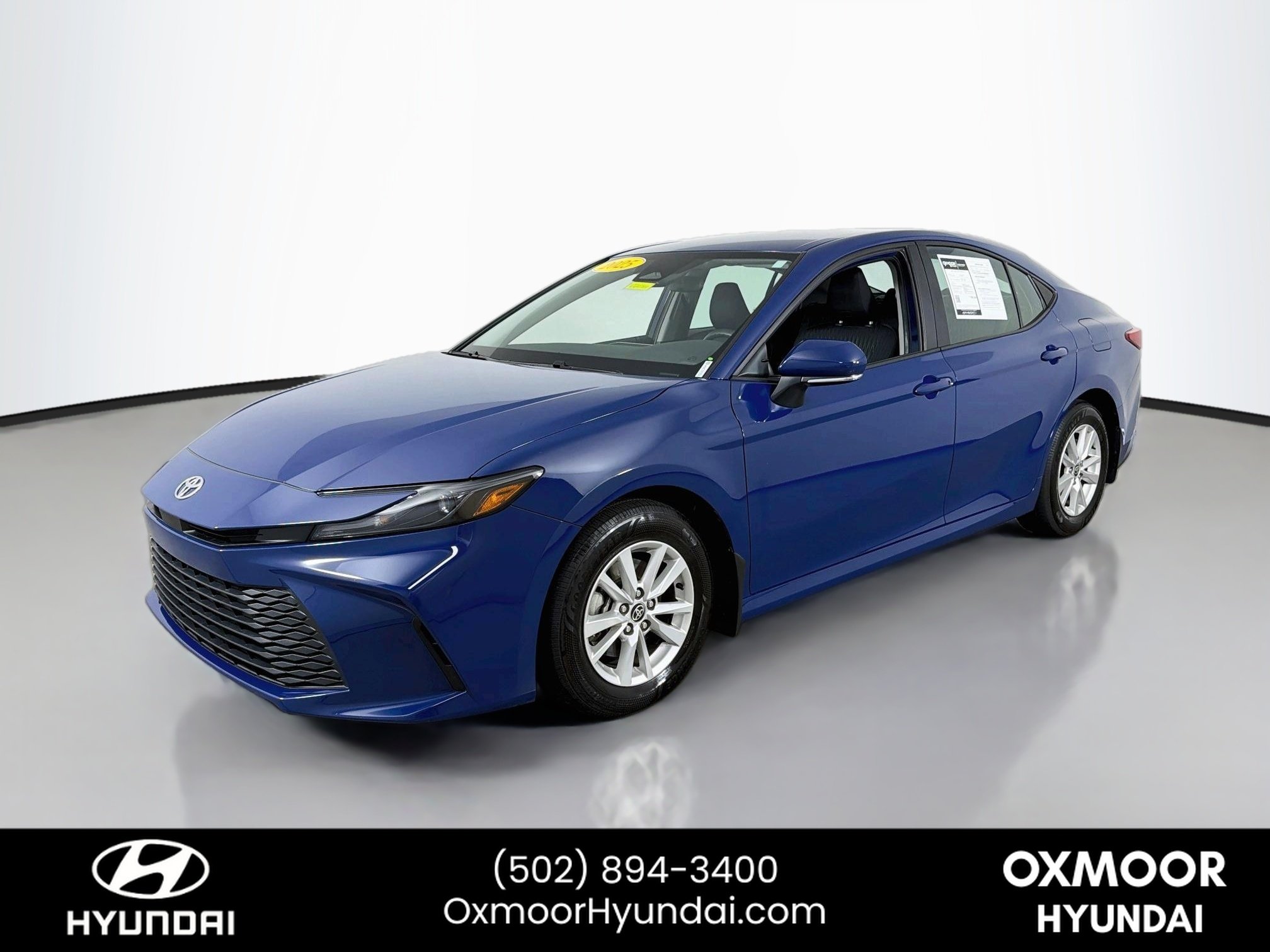 Used 2025 Reservoir Blue Toyota LE image 3