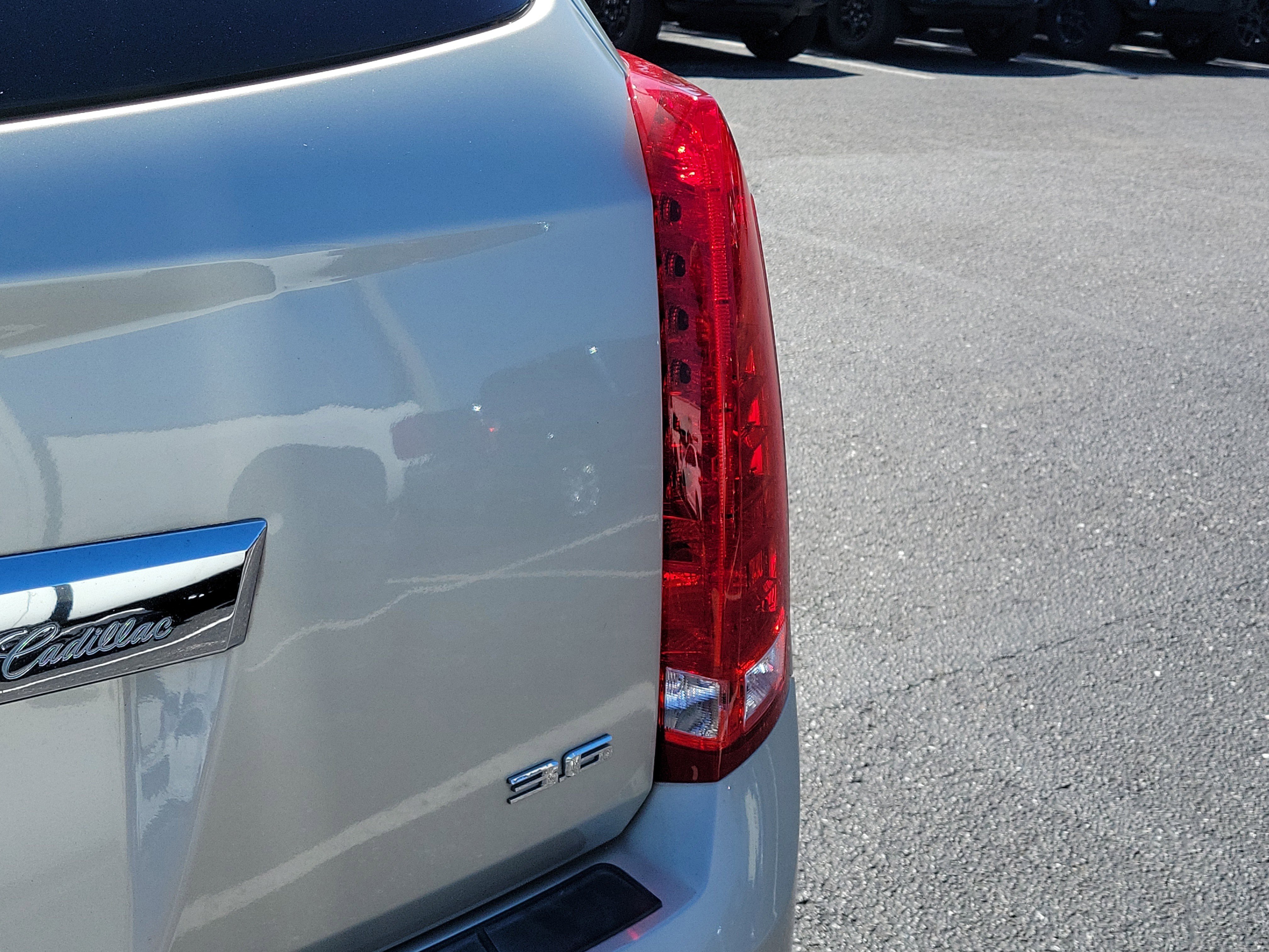 Used 2013 Silver Coast Metallic Cadillac Performance image 9