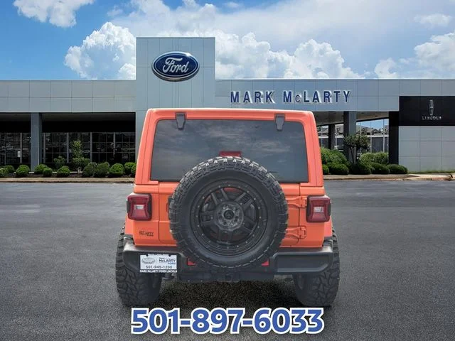Used 2020 Orange Jeep Unlimited Sahara image 4