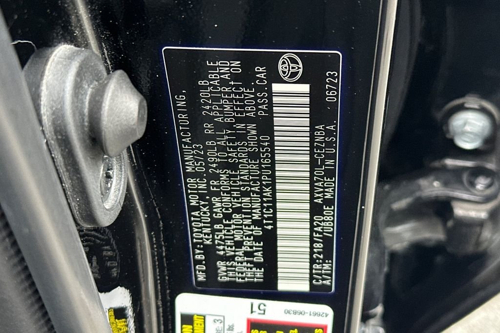 Used 2023 Midnight Black Metallic Toyota LE image 29