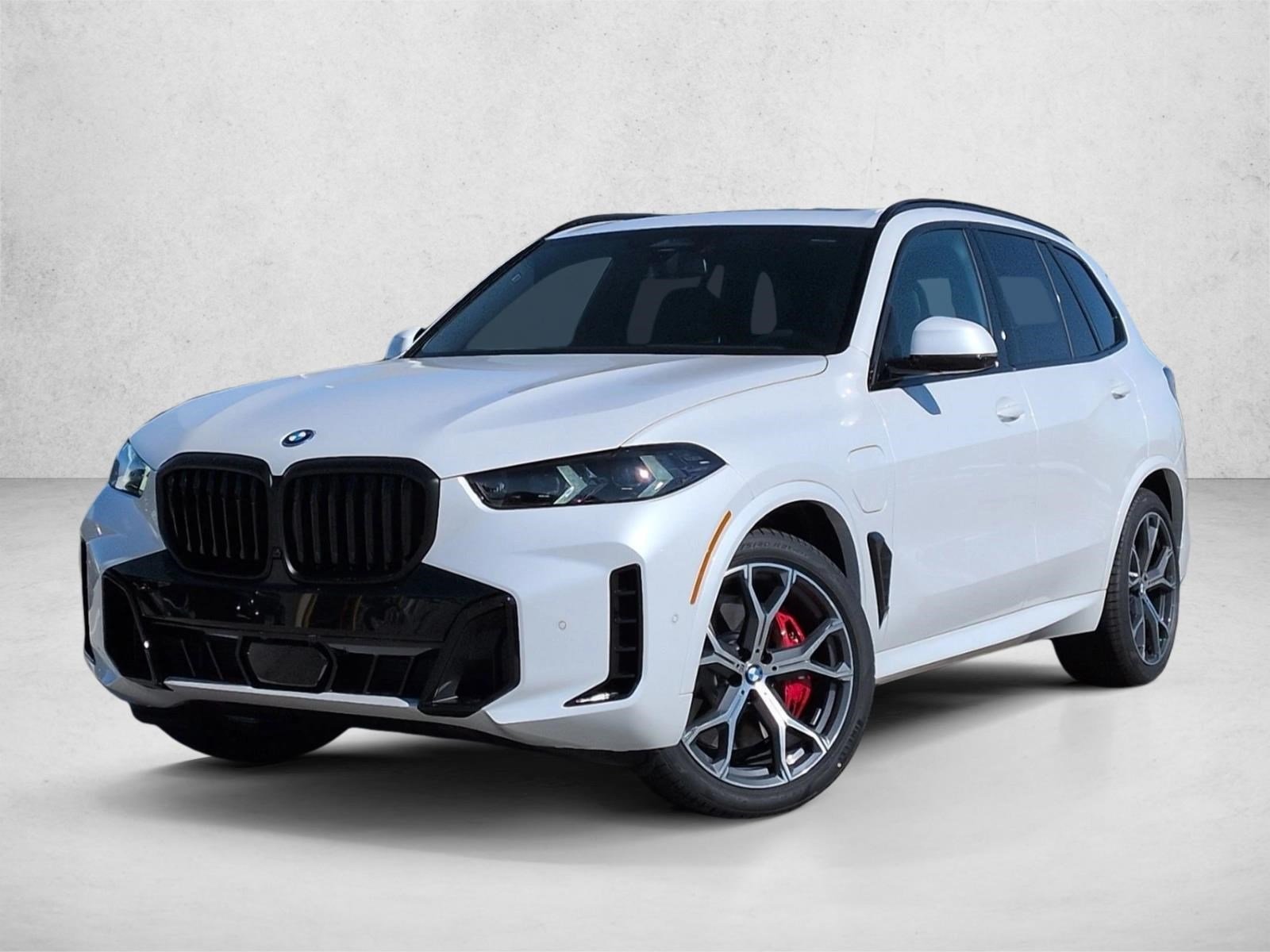 Used 2026 Mineral White Metallic BMW xDrive50e image 1