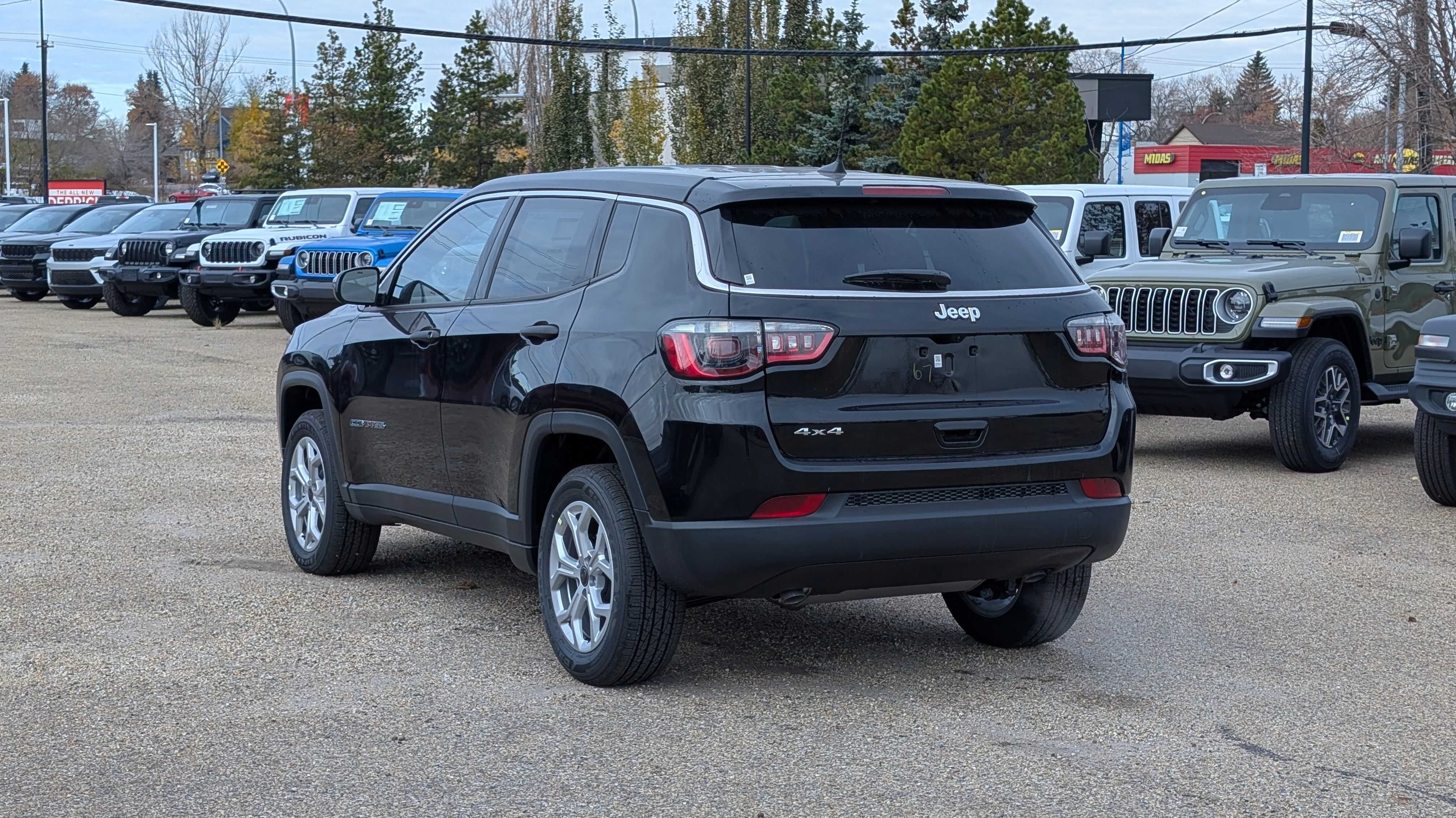 New 2026 Diamond Black Crystal Pearl Jeep Sport image 4