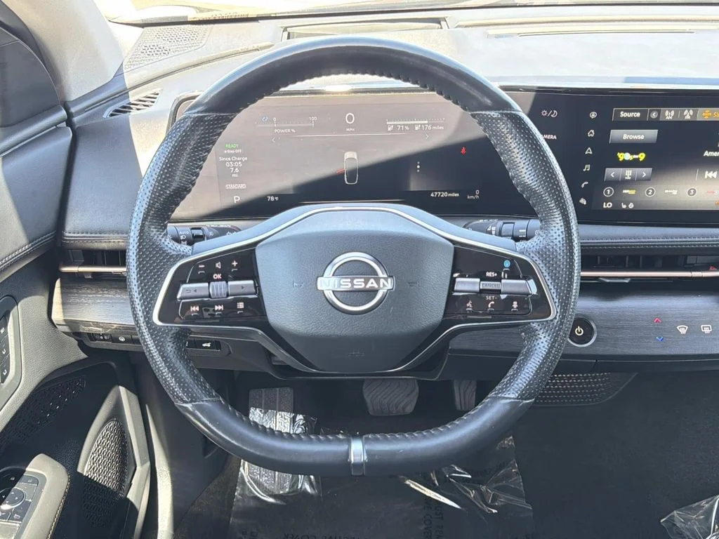 Used 2024 Black Diamond Pearl Nissan EVOLVE+ image 10