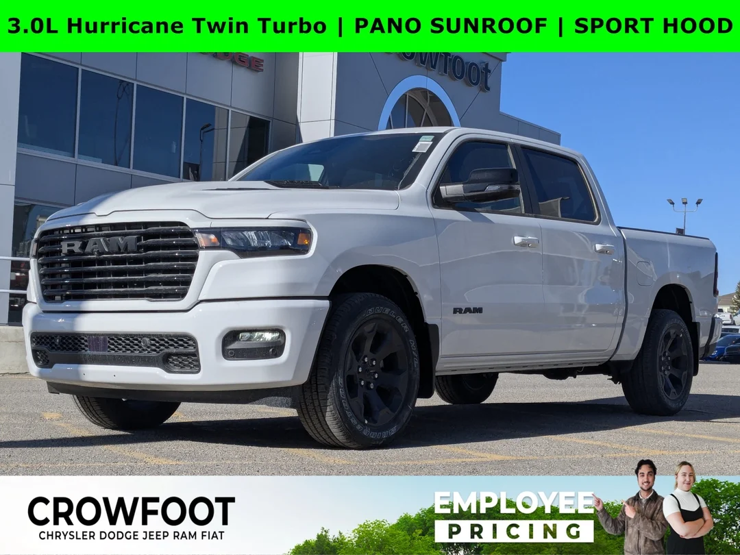 New 2026 White RAM Sport - - Pkg 21L - Pano Sunroof - Sport Hood - Trailer Brake Ctrl & More! image 1