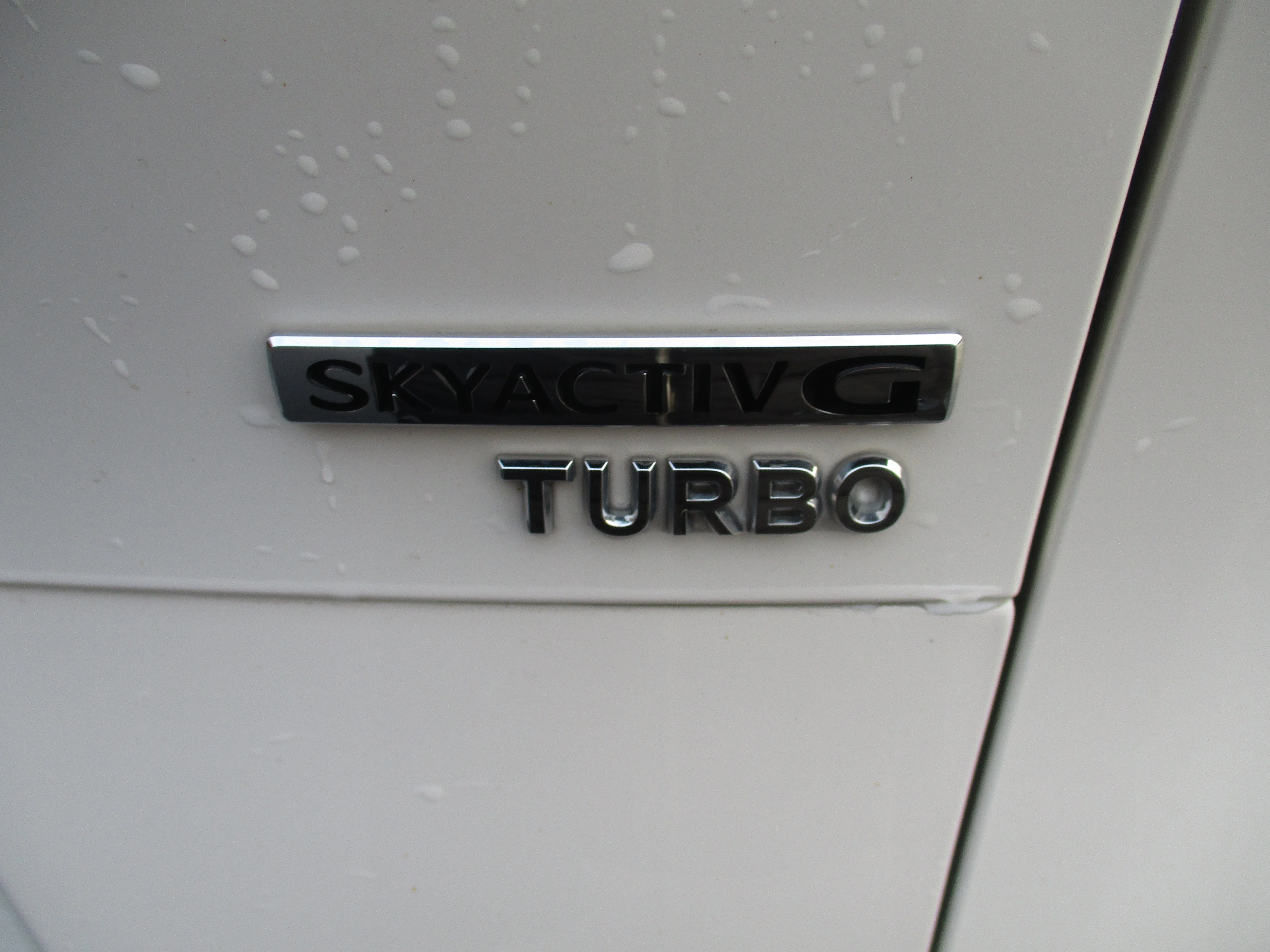 Used 2024 Snowflake White Pearl Mica Mazda 2.5 Turbo Premium Package image 13