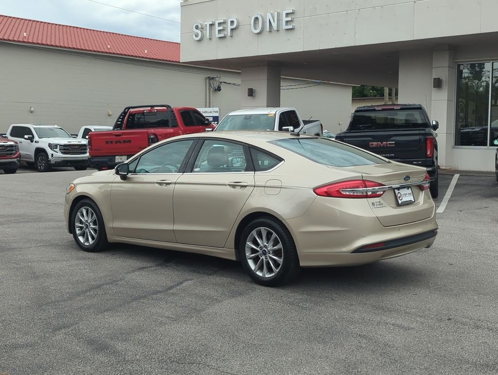 Used 2017 Gold Ford SE image 4
