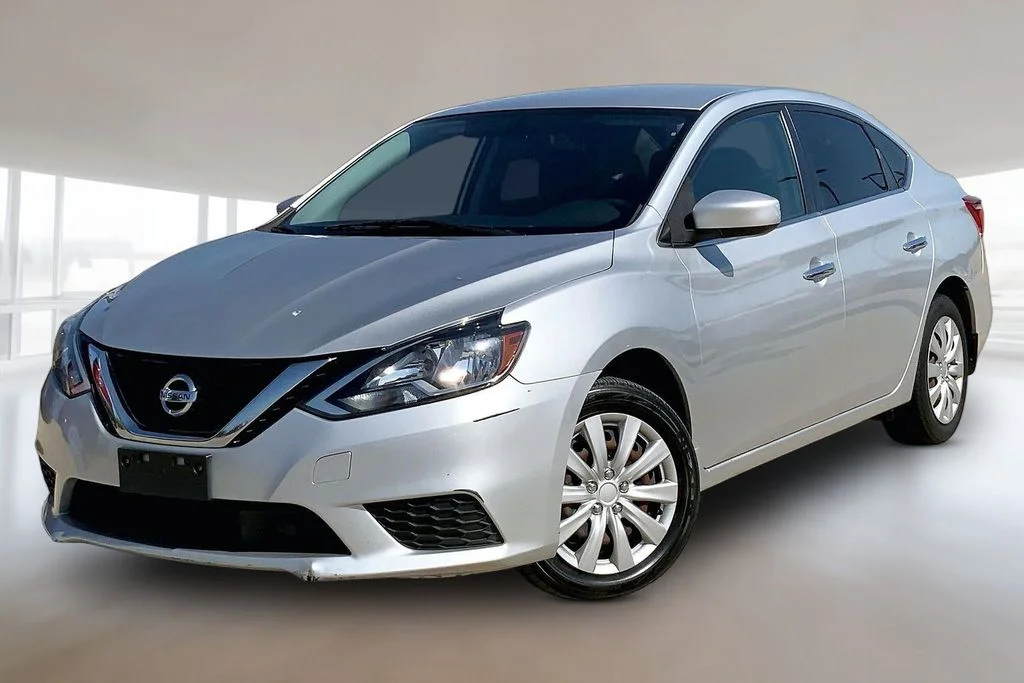 Used 2018 Brilliant Silver Metallic Nissan S image 1