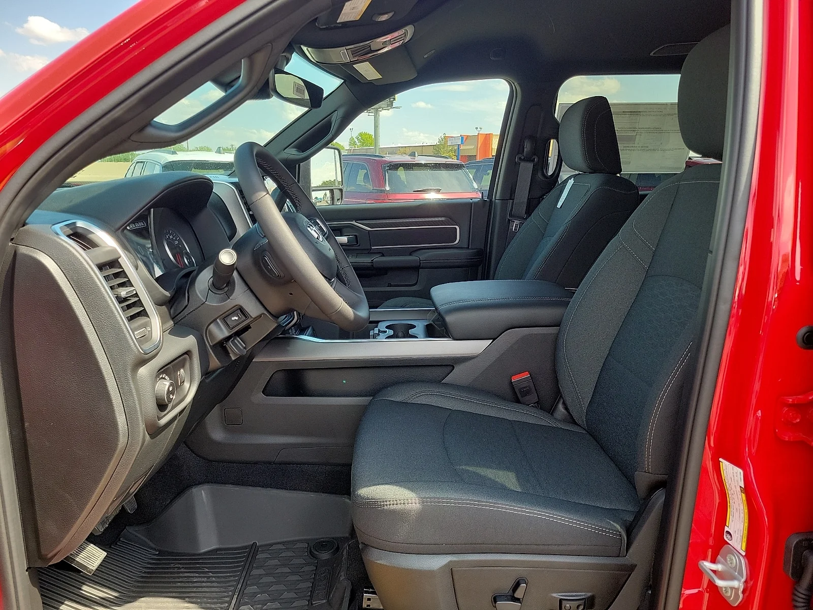 New 2026 Flame Red Ram LONE STAR CREW CAB 4X4 6