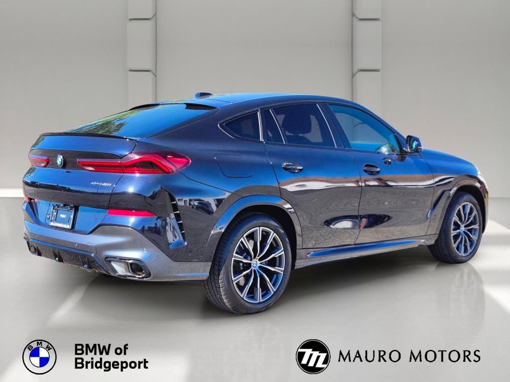 Certified Used 2024 Black BMW xDrive40i image 4
