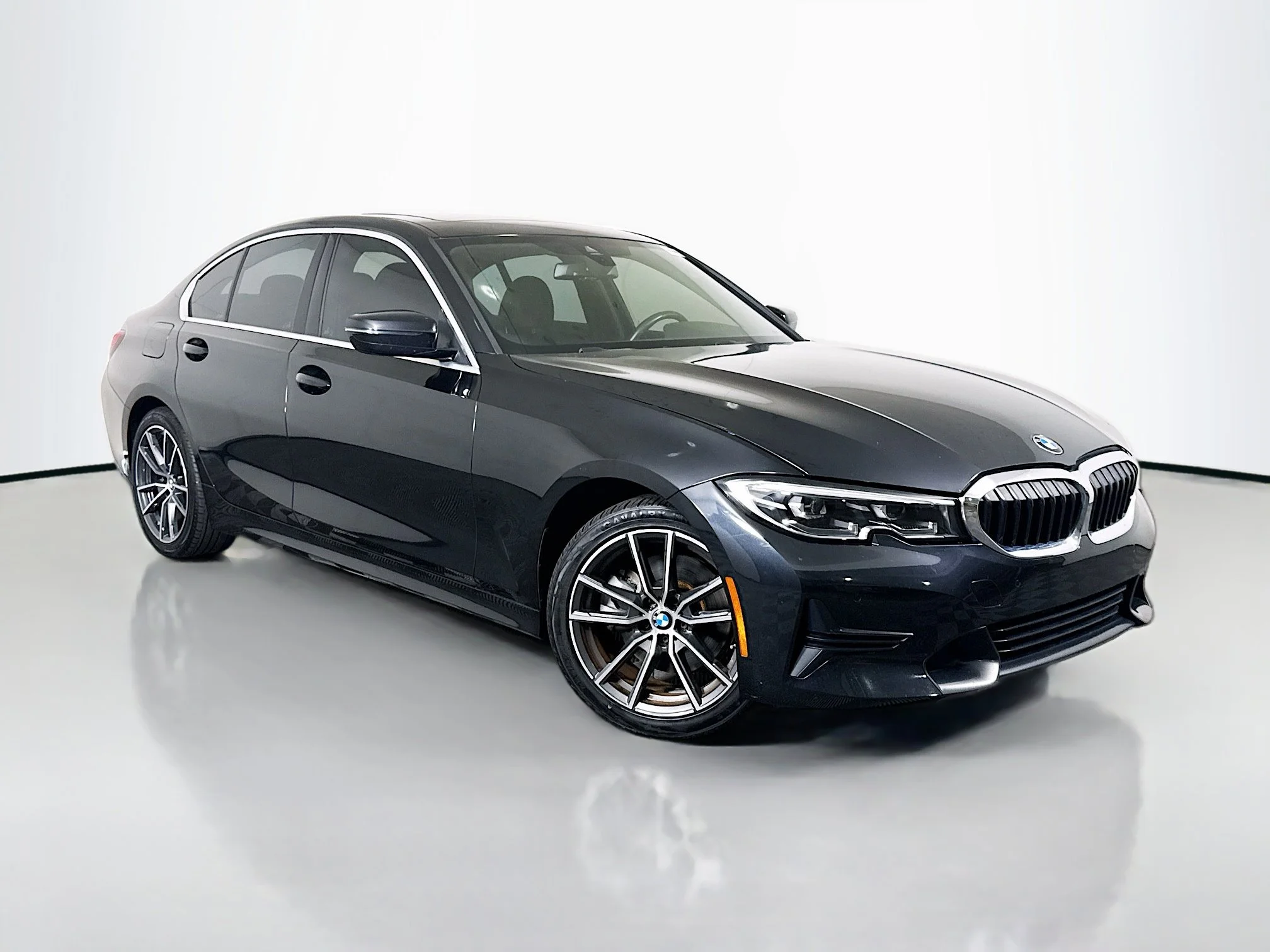 Used 2019 Black Sapphire Metallic BMW 330i image 1