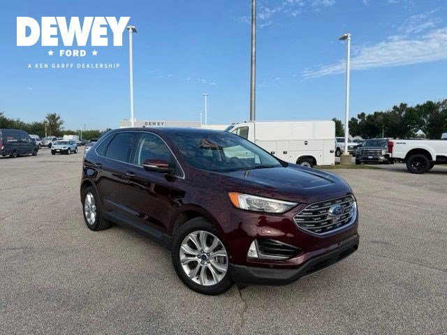 Used 2020 Burgundy Ford Titanium image 1