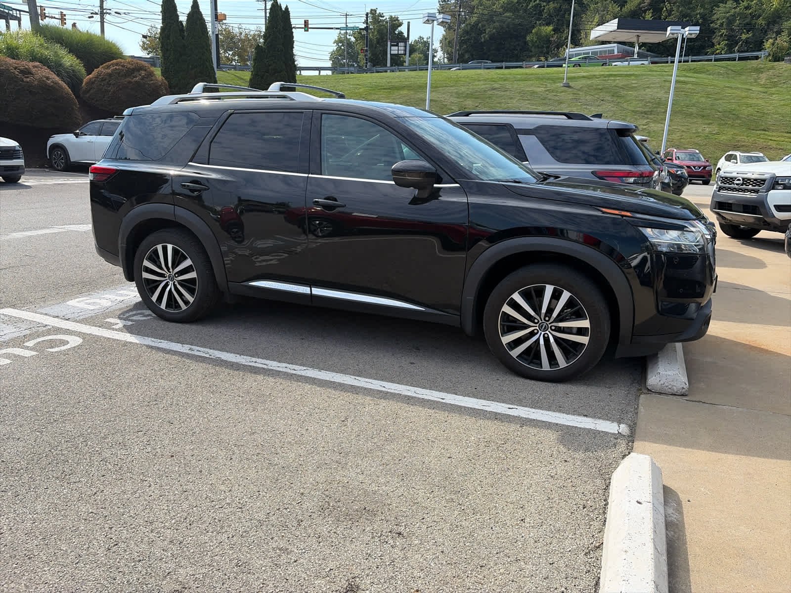 Certified Used 2024 Super Black Nissan Platinum image 4