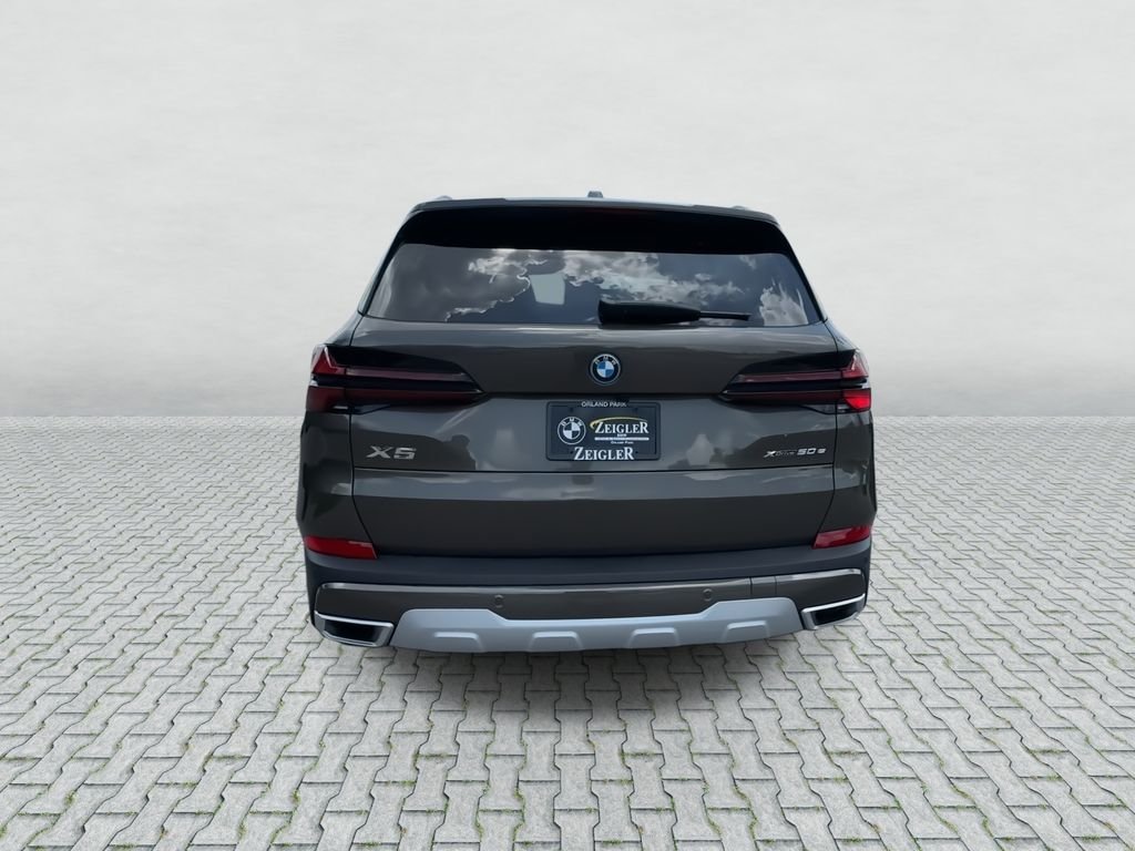 New 2026 Manhattan Green Metallic BMW xDrive50e image 7