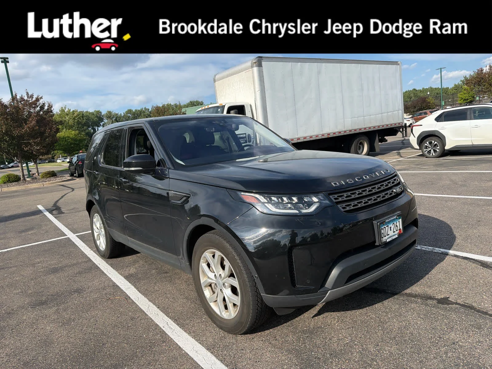 Used 2020 Farallon Black Premium Metallic Land Rover SE image 1