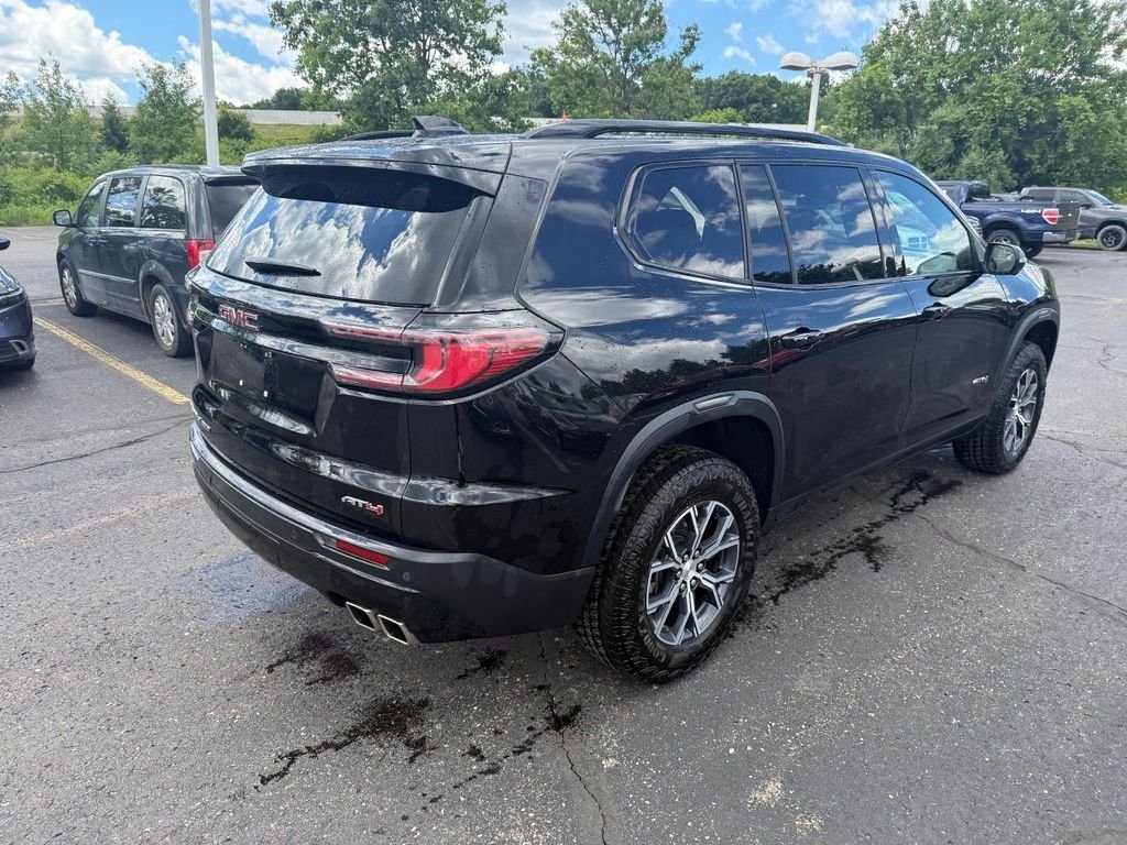 Used 2024 Ebony Twilight Metallic GMC AT4 image 3