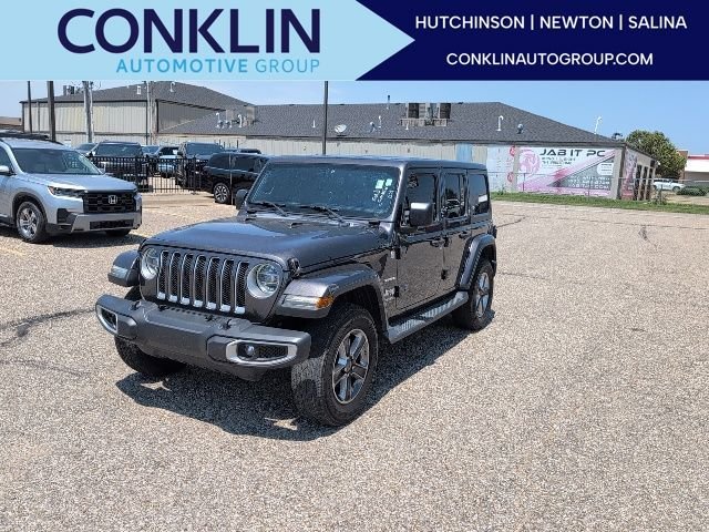 Used 2018 Crystal Metallic Jeep Unlimited Sahara image 1