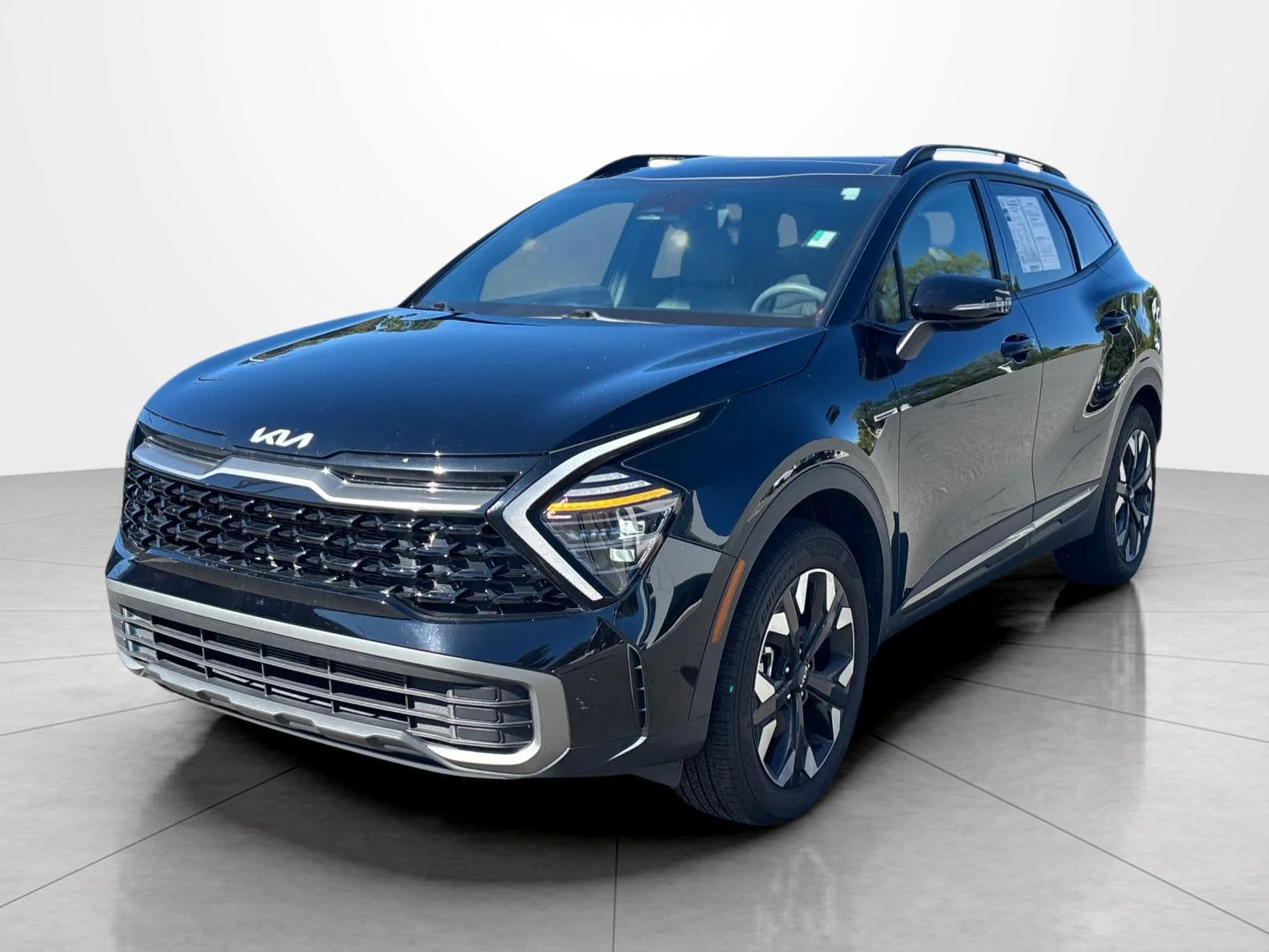 Used 2024 Ebony Black Kia X-Line image 1
