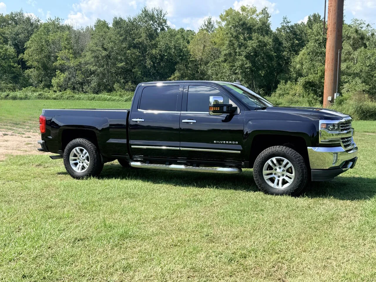 Used 2017 Black Chevrolet LTZ 4x4 4dr Crew Cab 6.5 ft. SB image 7