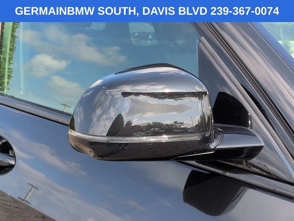 Certified Used 2024 Black Sapphire Metallic BMW xDrive40i image 13
