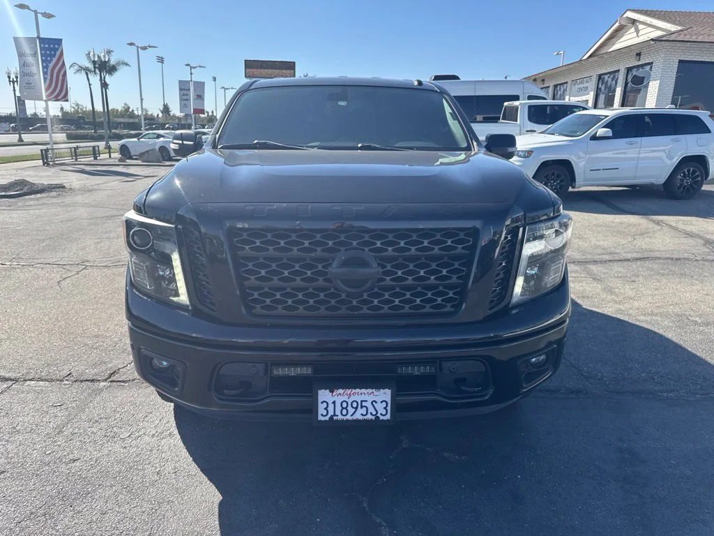 Used 2019 Magnetic Black Nissan SV image 2