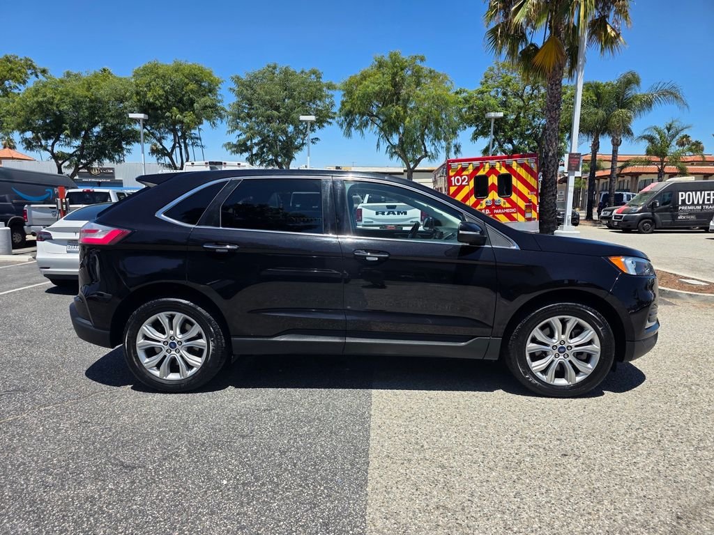 Used 2022 Black Ford Titanium image 4