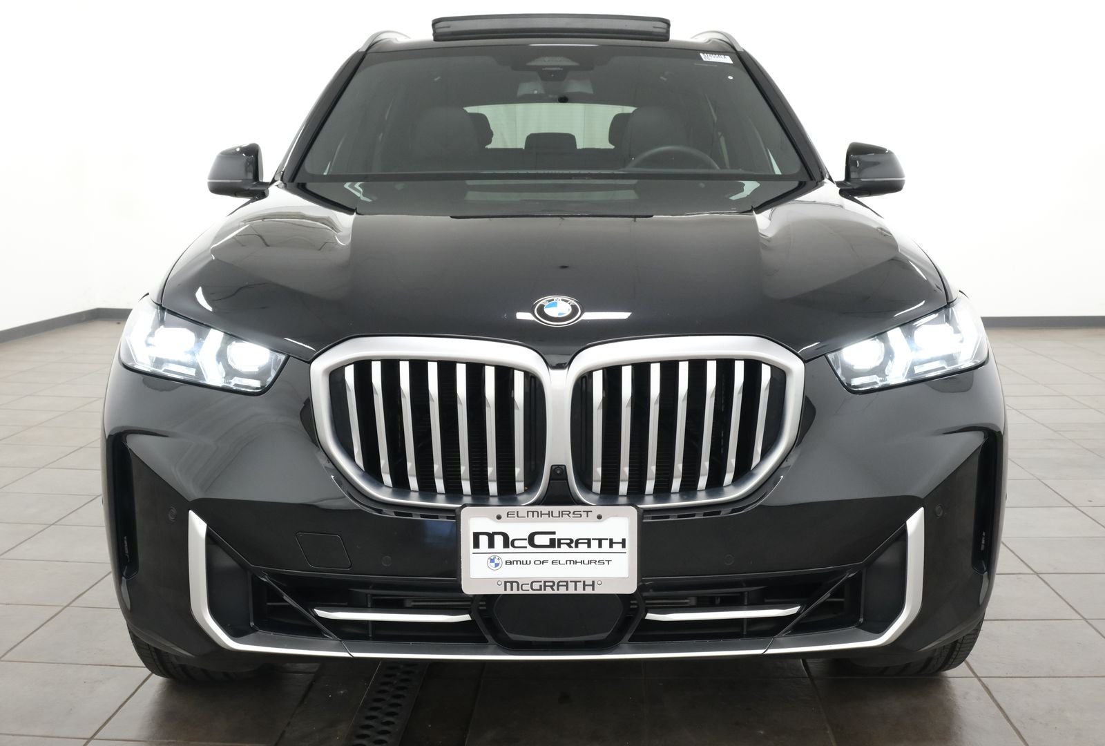 Certified Used 2026 Black Sapphire Metallic BMW xDrive40i image 7